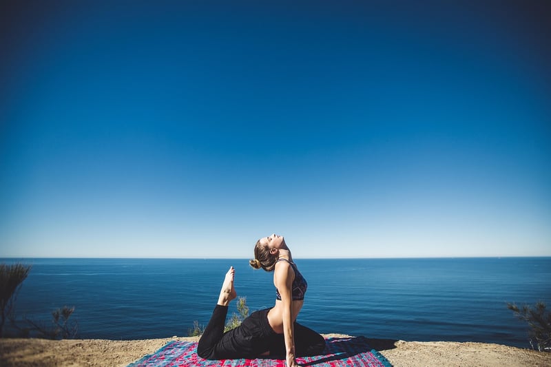 Woman combining yoga and Pilates